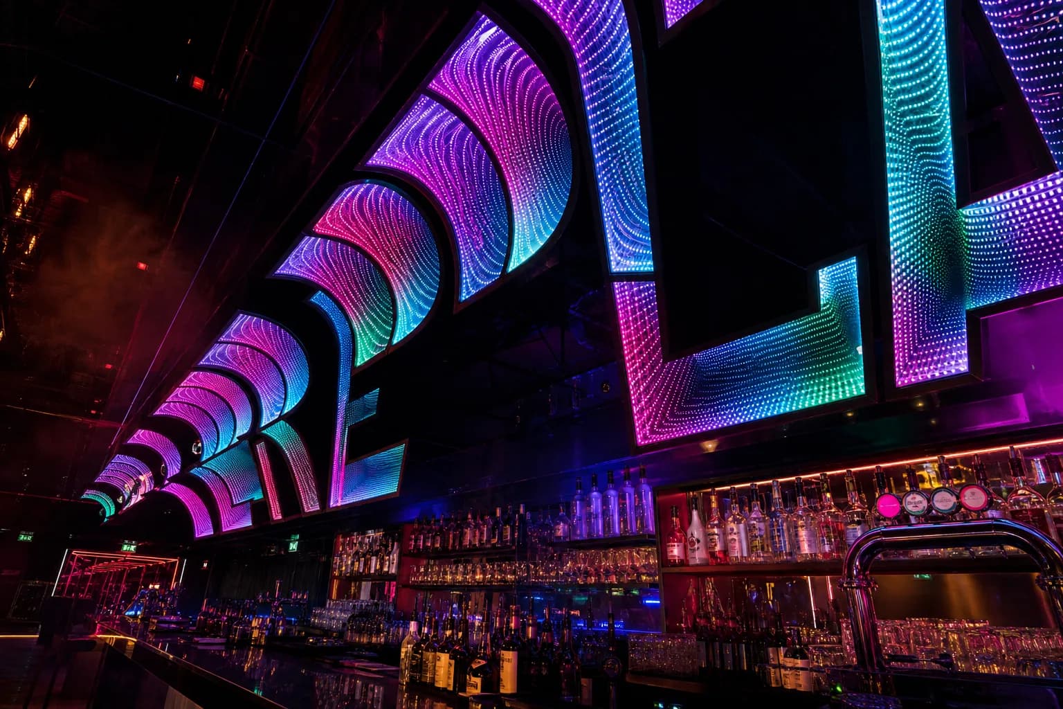 Word rendered in infinity mirror letters with endless RGB tunnels above a nightclub bar